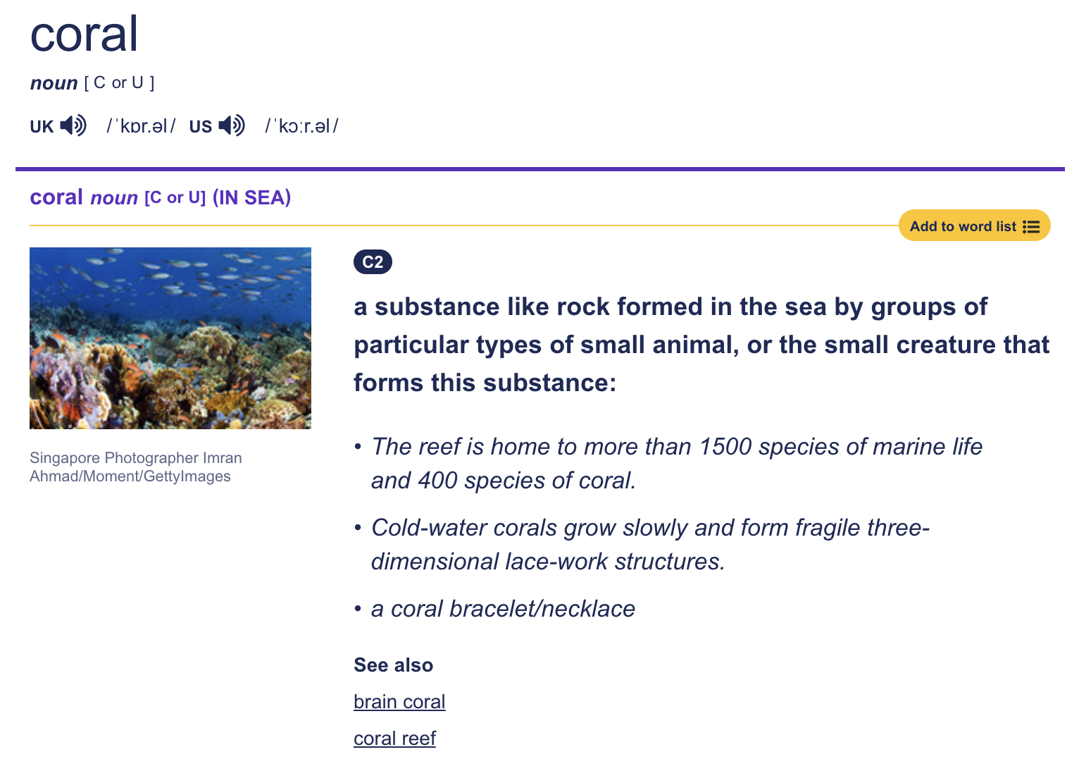 The Cambridge dictionary entry for "coral" with a C2 level badge